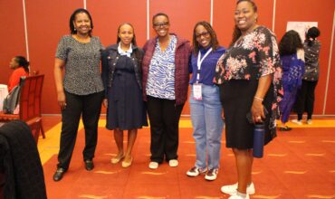 (Left) AWSC Team & (Right) Strathmore Team with their Coach Ms. Wairu Kinyori at WiL CoP Convening in Naivasha
